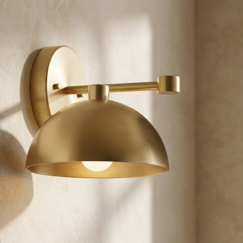 Eloria sconce brass detail on plaster