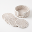 White Rattan Coaster Set of 4 on white background