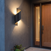 Spiral Outdoor LED Wall Light mounted beside a front door